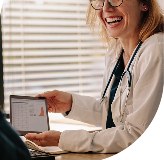 Doctor analyzing a graph on a mobile tablet